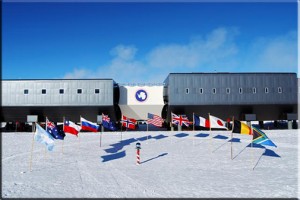 Flags fly at the ceremonial South Pole in front of the Elevated Station in honor of the 12 original signatory nations of the Antarctic Treaty. The flags are set in a semicircle and are spaced about 1.5 meters (5 feet) apart. The US flag is directly flanked by the Norwegian (grid east) and British (grid west) flags in honor of Amundsen and Scott. The remainder of the flags are represented in the order of their signing the Antarctic Treaty. The nations represented include: Argentina, Australia, Chile, Russia, New Zealand, Norway, USA, UK, France, Japan, Belgium, and South Africa. (February 2008)
